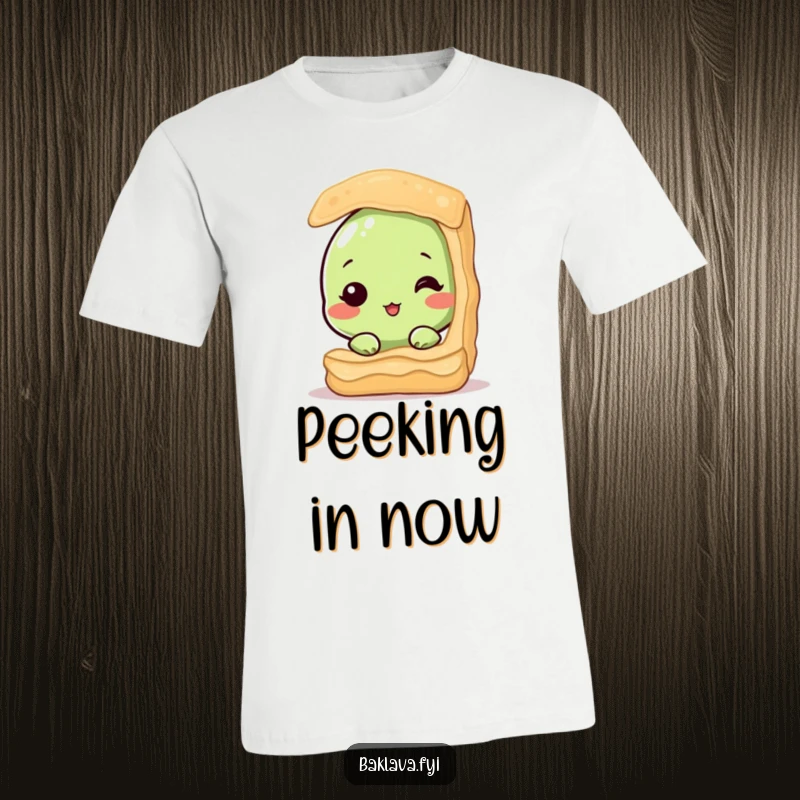 Funny t-shirt showcasing a bashful pistachio nut subtly peeking from behind a delicious baklava pastry. Whimsical and humorous apparel.